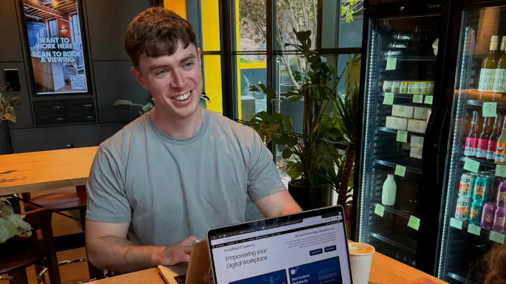 Dan working at a laptop